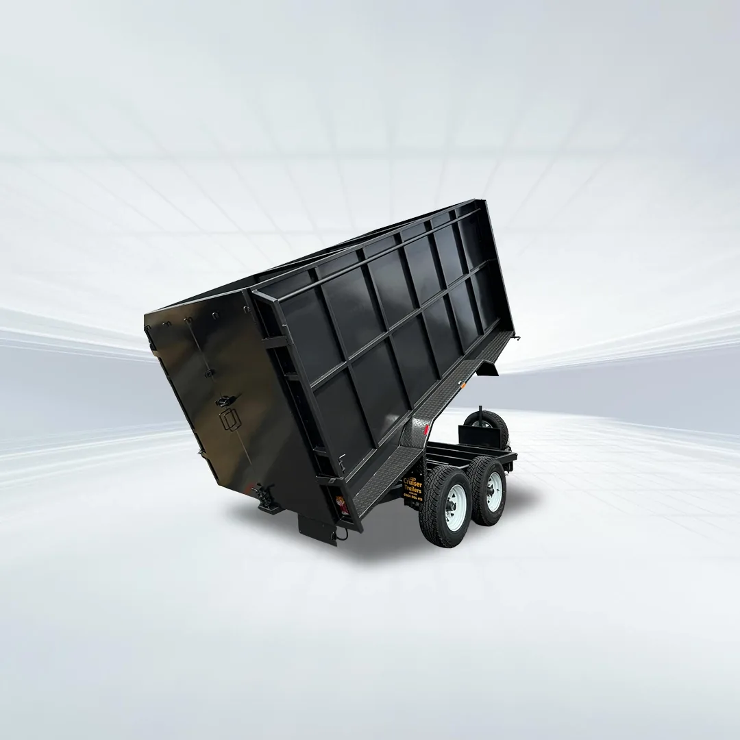 Studio side angled view of black 10x5 tandem tipper trailer with 1800mm high sides raised on white background.
