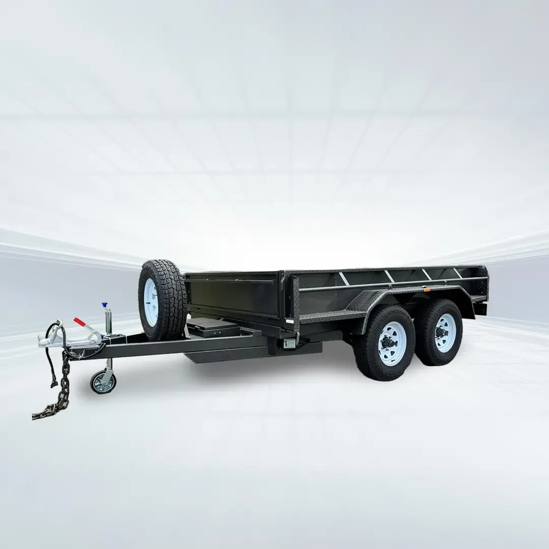 Studio rear angled view of black 10x6 tandem tipper trailer with hydraulic ram and high sides on white background.